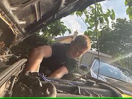TP Smart Repairs technician, Jamie, working on a car
